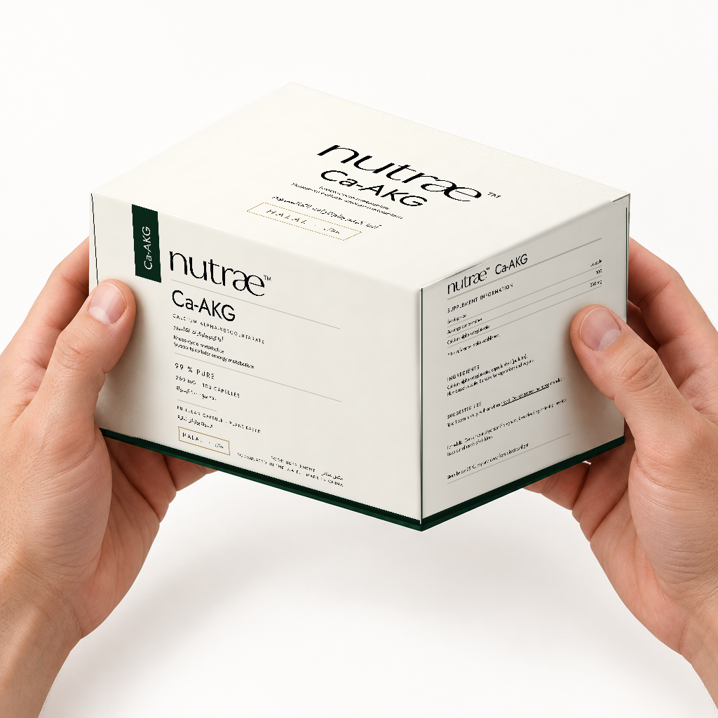 Nutrae Ca-AKG carton - held in two hands