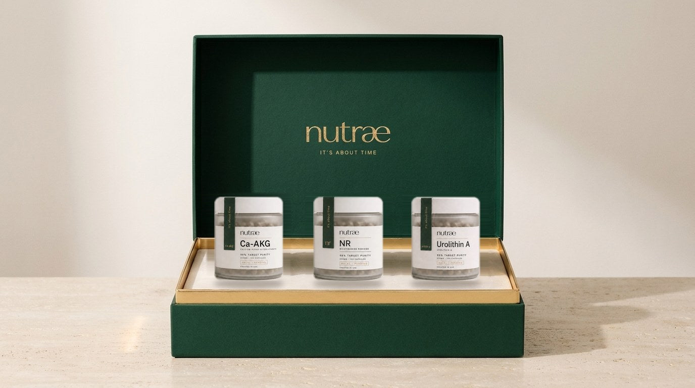 The Nutrae Trio Gift Box — all three jars in the deep-green presentation box with gold-foil nutræ lid